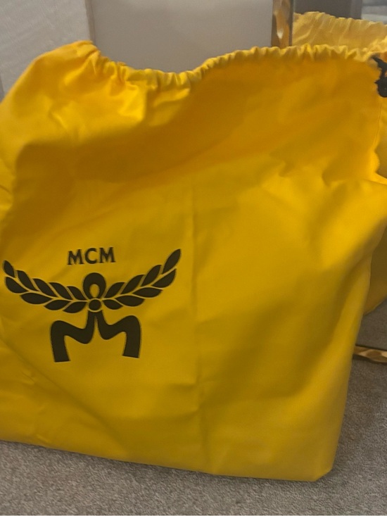 MCM Handbags - MCM Cognac Monogram Messenger Bag with Tan Leather Strap